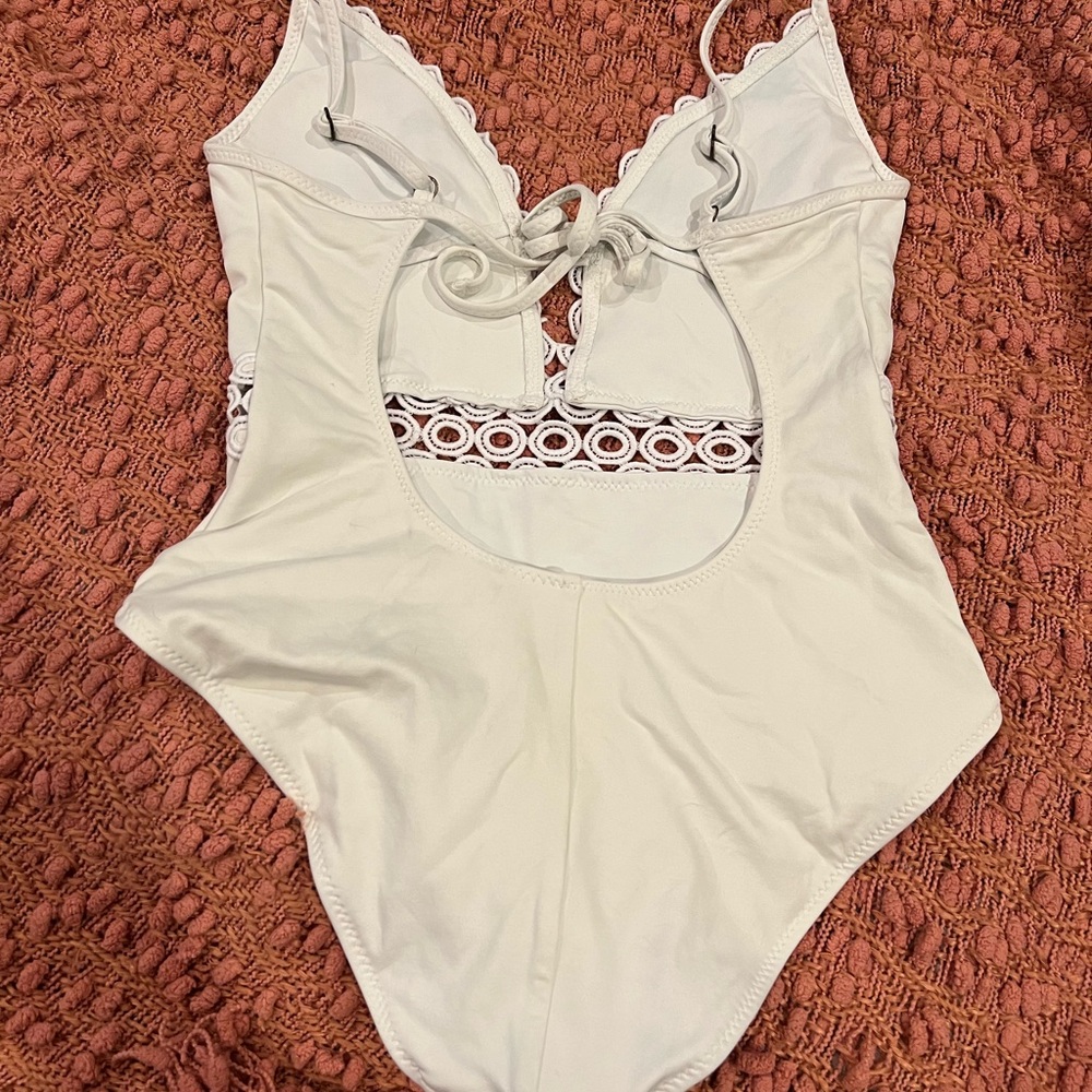 Becca White Ringlet Plunge Over The Shoulder One Piece Swimsuit